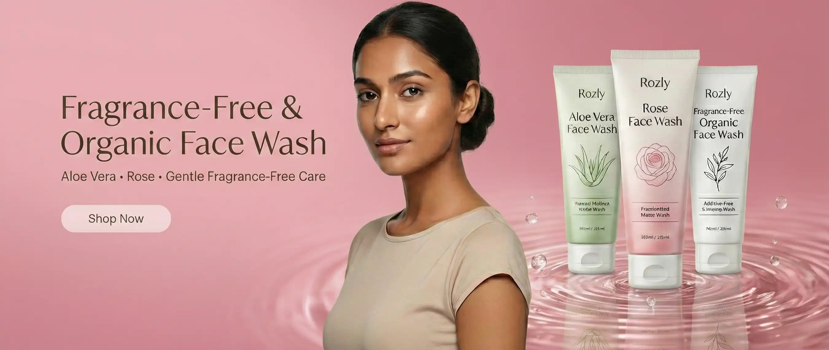 A woman presenting an organic fragrance-free face wash for sensitive skin with luxury pink aesthetics